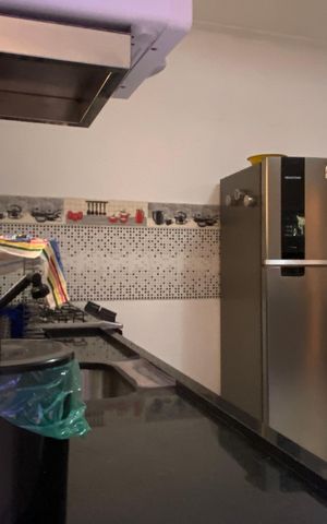 Casa à venda com 125m², 2 quartos e 2 vagas Casa à venda com 125m², 2 quartos e 2 vagasCozinha