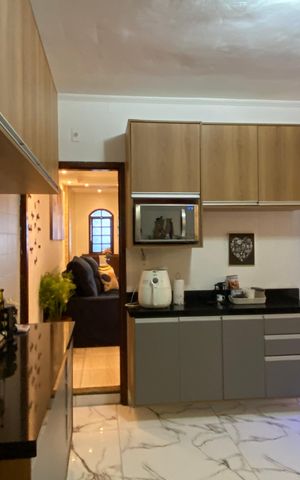 Casa à venda com 125m², 2 quartos e 2 vagas Casa à venda com 125m², 2 quartos e 2 vagasCozinha
