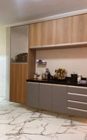 Casa à venda com 125m², 2 quartos e 2 vagas Casa à venda com 125m², 2 quartos e 2 vagasCozinha