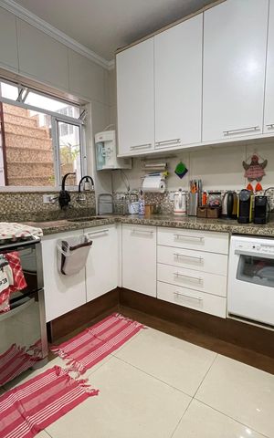 Casa à venda com 124m², 4 quartos e 1 vaga Casa à venda com 124m², 4 quartos e 1 vagaCozinha
