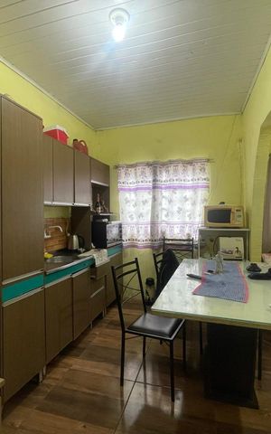 Casa à venda com 185m², 3 quartos e 4 vagas Casa à venda com 185m², 3 quartos e 4 vagasCozinha