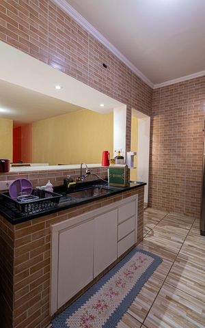 Casa à venda com 234m², 3 quartos e 3 vagas Casa à venda com 234m², 3 quartos e 3 vagasCasa 2 - Sala e Cozinha