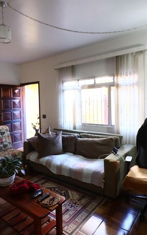 Casa à venda com 208m², 5 quartos e 4 vagasSala