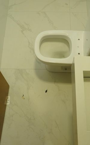 Casa à venda com 100m², 3 quartos e 2 vagasBanheiro da suíte 2