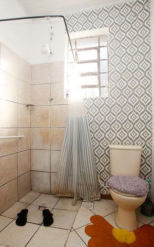 Casa à venda com 180m², 3 quartos e 2 vagasBanheiro 1