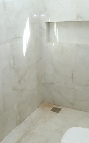 Casa à venda com 118m², 3 quartos e 2 vagasBanheiro Suíte 1