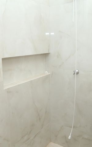 Casa à venda com 118m², 3 quartos e 2 vagasBanheiro Suíte 2