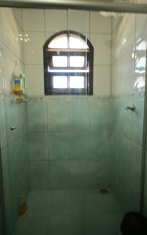 Casa à venda com 600m², 3 quartos e 6 vagasBanheiro Suíte 2