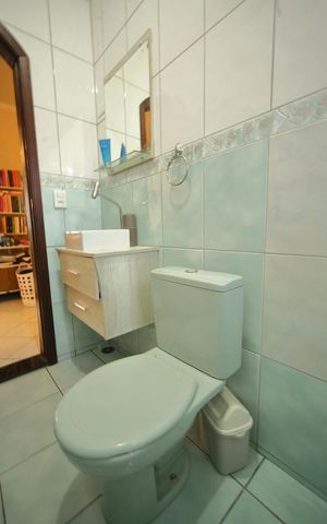 Casa à venda com 600m², 3 quartos e 6 vagasBanheiro Suíte 3