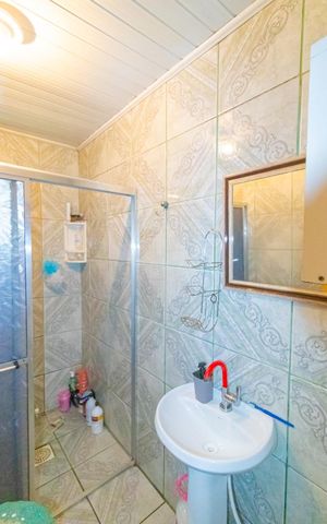 Casa à venda com 297m², 3 quartos e 2 vagasBanheiro social