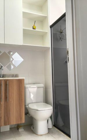 Casa de condomínio para alugar com 84m², 2 quartos e 2 vagas Casa de condomínio para alugar com 84m², 2 quartos e 2 vagasBanheiro da Suíte 1