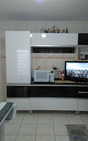 Casa à venda com 148m², 2 quartos e 2 vagas Casa à venda com 148m², 2 quartos e 2 vagasCozinha