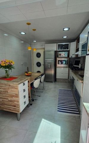 Casa à venda com 125m², 2 quartos e 2 vagas Casa à venda com 125m², 2 quartos e 2 vagasCozinha