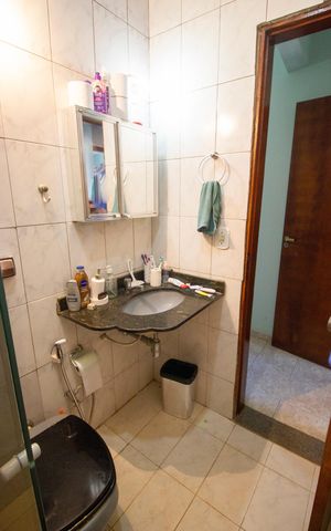 Casa de condomínio à venda com 312m², 4 quartos e 4 vagasBanheiro