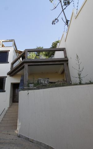 Casa à venda com 400m², 6 quartos e 4 vagasÁrea externa