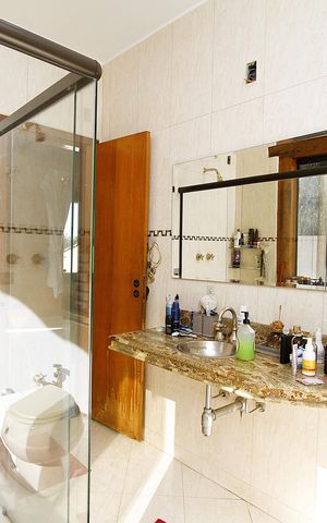 Casa à venda com 400m², 6 quartos e 4 vagasBanheiro da Suíte