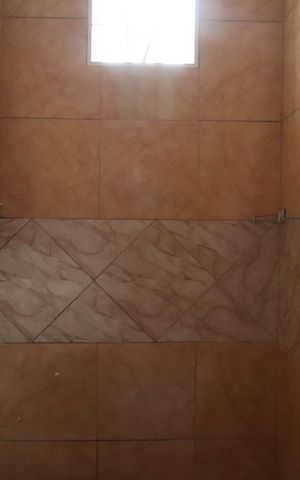 Casa para alugar com 70m², 2 quartos e 5 vagasBanheiro do Quarto 1
