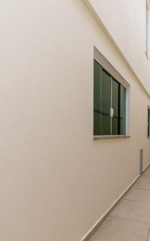 Casa à venda com 125m², 3 quartos e 3 vagas Casa à venda com 125m², 3 quartos e 3 vagasCorredor externo