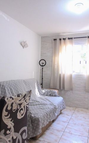 Casa à venda com 100m², 3 quartos e 2 vagas Casa à venda com 100m², 3 quartos e 2 vagasSala