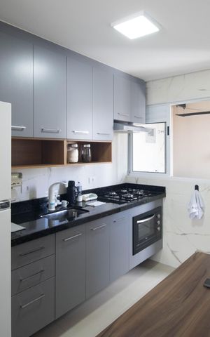 Apartamento à venda com 50m², 2 quartos e 1 vaga Apartamento à venda com 50m², 2 quartos e 1 vagaCozinha - Armários