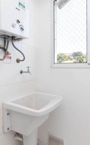 Apartamento à venda com 56m², 2 quartos e 1 vaga Apartamento à venda com 56m², 2 quartos e 1 vagaCozinha e Área de Serviço