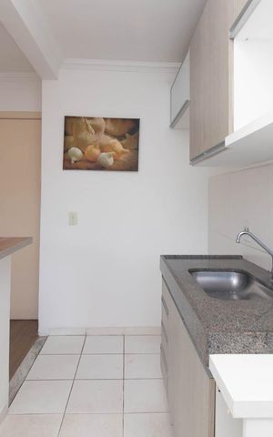 Apartamento à venda com 56m², 2 quartos e 1 vaga Apartamento à venda com 56m², 2 quartos e 1 vagaCozinha e Área de Serviço