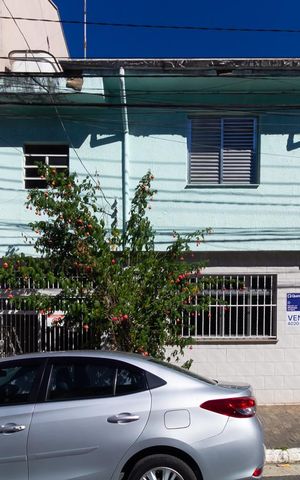 Casa à venda com 70m², 2 quartos e 1 vaga Casa à venda com 70m², 2 quartos e 1 vagaFachada