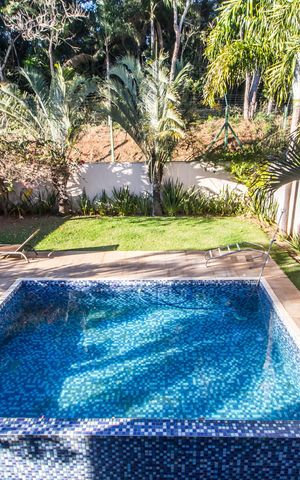 Casa de condomínio à venda com 615m², 5 quartos e 7 vagas Casa de condomínio à venda com 615m², 5 quartos e 7 vagasVista da Suíte