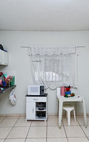 Casa à venda com 480m², 5 quartos e 1 vaga Casa à venda com 480m², 5 quartos e 1 vagaCozinha Casa 1