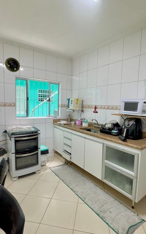 Casa à venda com 200m², 3 quartos e 4 vagas Casa à venda com 200m², 3 quartos e 4 vagasCozinha