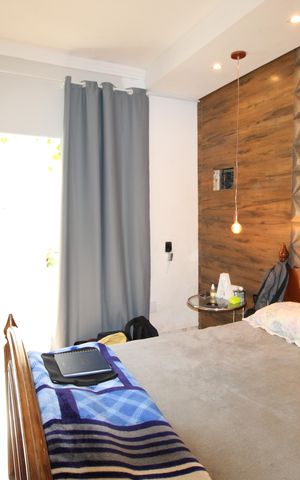 Casa à venda com 200m², 2 quartos e 4 vagasQuarto 1 com Suíte