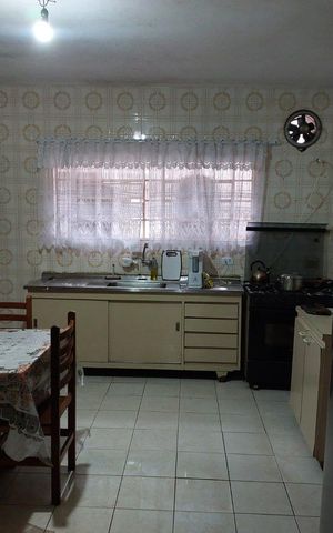 Casa à venda com 199m², 4 quartos e 2 vagas Casa à venda com 199m², 4 quartos e 2 vagasCozinha