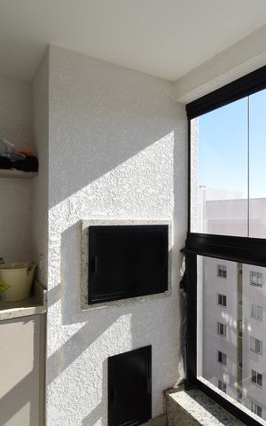 Apartamento à venda com 69m², 2 quartos e 1 vagaVaranda com Churrasqueira