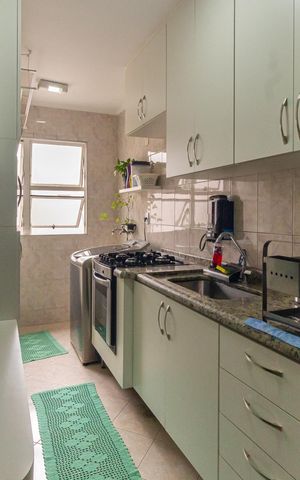 Apartamento à venda com 77m², 3 quartos e 2 vagas Apartamento à venda com 77m², 3 quartos e 2 vagasCozinha e Área de Serviço