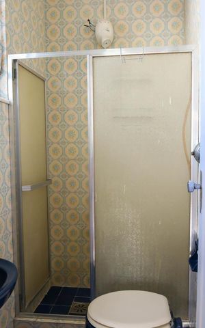Casa de condomínio para alugar com 150m², 3 quartos e 3 vagasBanheiro do Quarto Suite- 2º Pavimento