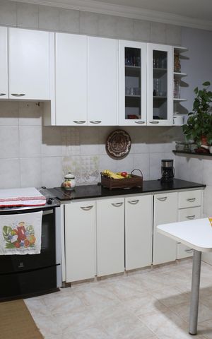 Casa à venda com 210m², 3 quartos e 2 vagasCozinha e Área de Serviço