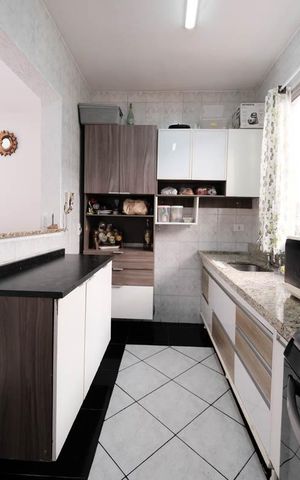 Casa de condomínio à venda com 119m², 2 quartos e 2 vagasSala/Cozinha