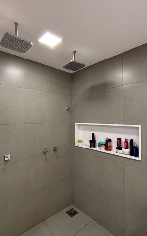 Casa de condomínio à venda com 360m², 4 quartos e 2 vagas Casa de condomínio à venda com 360m², 4 quartos e 2 vagasBanheiro da Suíte 1