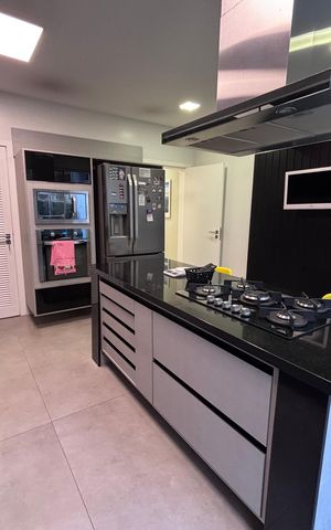 Casa de condomínio à venda com 360m², 4 quartos e 2 vagas Casa de condomínio à venda com 360m², 4 quartos e 2 vagasCozinha