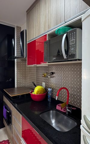 Apartamento à venda com 49m², 2 quartos e 1 vaga Apartamento à venda com 49m², 2 quartos e 1 vagaCozinha e Área de Serviço