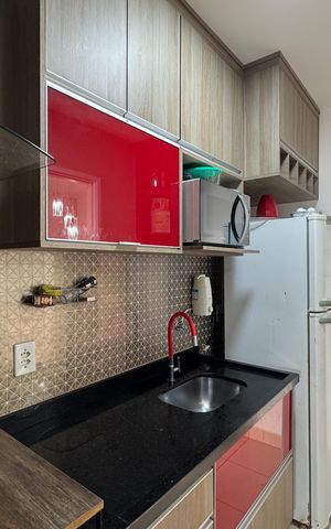 Apartamento à venda com 49m², 2 quartos e 1 vaga Apartamento à venda com 49m², 2 quartos e 1 vagaCozinha e Área de Serviço
