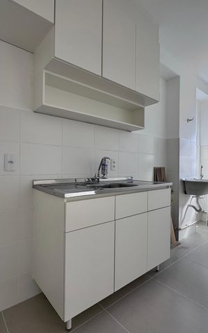 Apartamento à venda com 50m², 2 quartos e 1 vaga Apartamento à venda com 50m², 2 quartos e 1 vagaCozinha e Área de Serviço