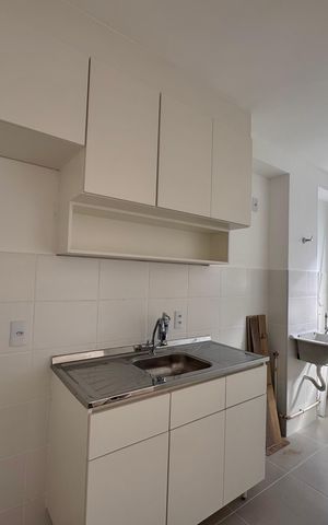 Apartamento à venda com 50m², 2 quartos e 1 vaga Apartamento à venda com 50m², 2 quartos e 1 vagaCozinha e Área de Serviço