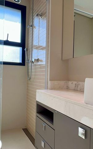 Apartamento à venda com 70m², 1 quarto e 2 vagas Apartamento à venda com 70m², 1 quarto e 2 vagasBanheiro da Suíte