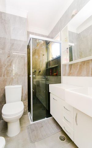 Casa de condomínio à venda com 400m², 4 quartos e 4 vagasBanheiro da Suíte 2