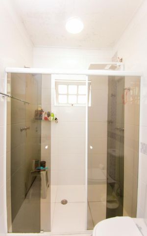 Casa de condomínio à venda com 400m², 4 quartos e 4 vagasBanheiro da Suíte 3