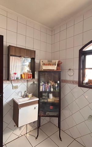 Casa à venda com 240m², 3 quartos e 3 vagas Casa à venda com 240m², 3 quartos e 3 vagasBanheiro da Suíte 1
