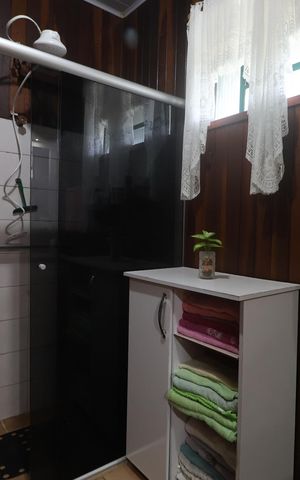 Casa à venda com 182m², 3 quartos e 3 vagasBanheiro 
