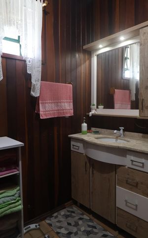 Casa à venda com 182m², 3 quartos e 3 vagasBanheiro 