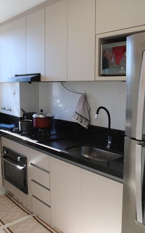 Apartamento à venda com 52m², 2 quartos e 1 vagaCozinha e Área de Serviço
